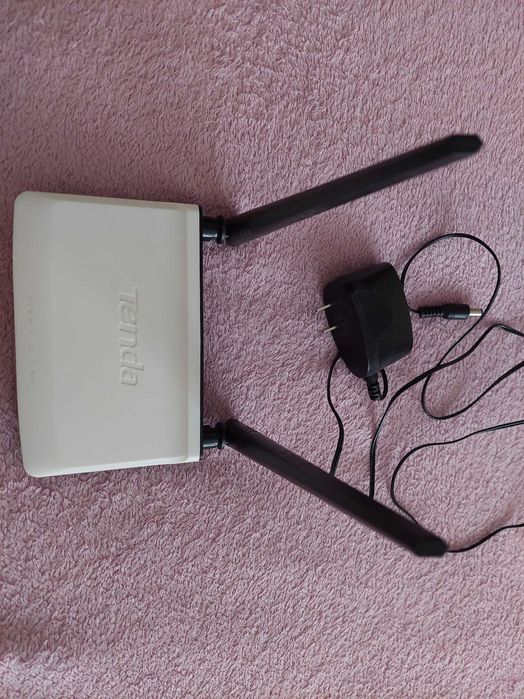 Роутер Tenda тільки китайська мова  але працює краще, ніж xiaomi