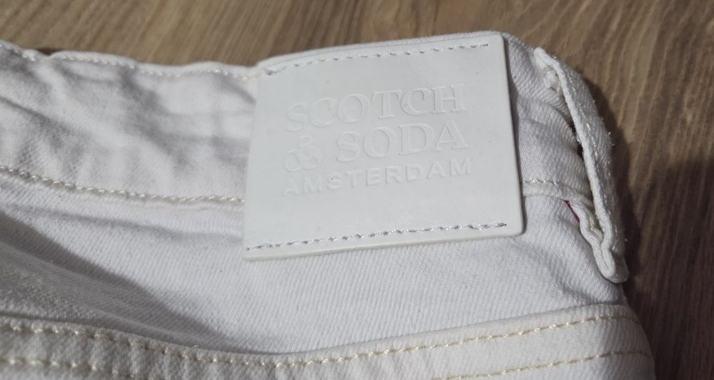 Jeansy białe damskie