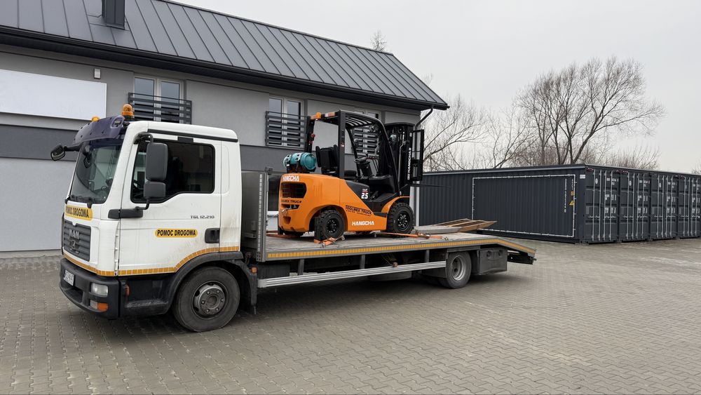 Pomoc drogowa, holowanie, laweta transport maszyn budowlanych rolnicze