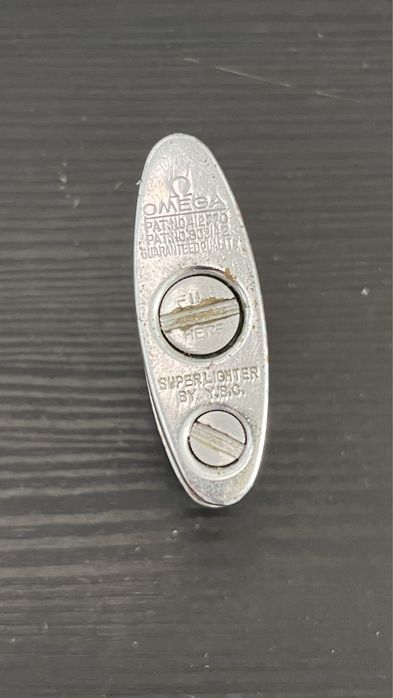 Isqueiro Omega antigo