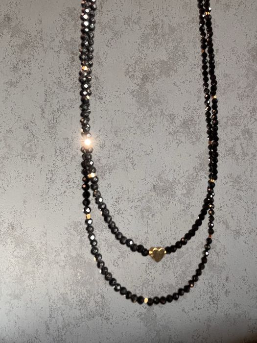 Чокери з чорного оніксу.