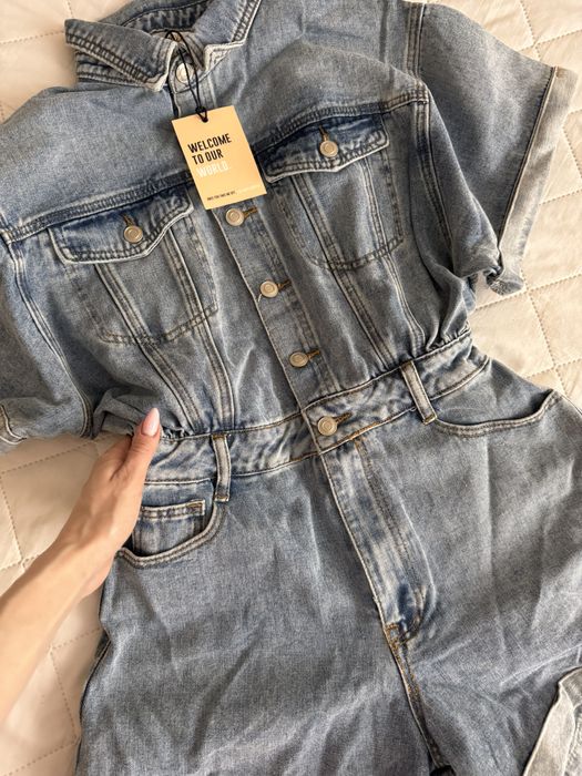 Джинсовий комбінезон із кишенями