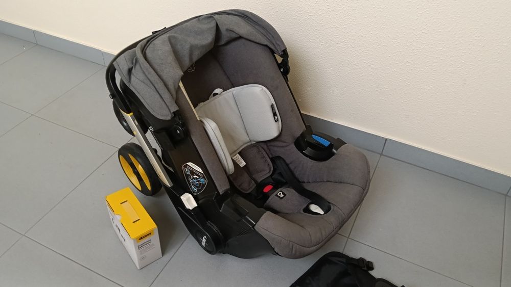 Doona cadeira auto passeio com extras