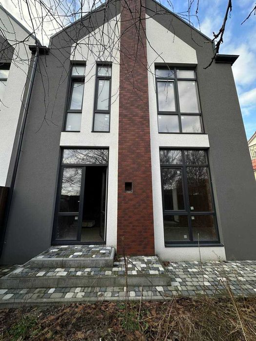 Таунхаус 112 м² з горищем і каміном.Центральні комунікації,топ-локація