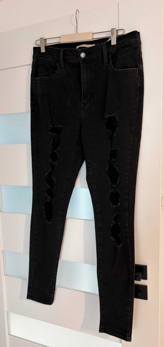 Jeansy Levi's 720 High Rise Super Skinny W31 czarne przetarcia dziury