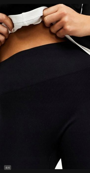 Czarne spodnie dzwony prążkowane bezszwowe casual S 36 ASOS