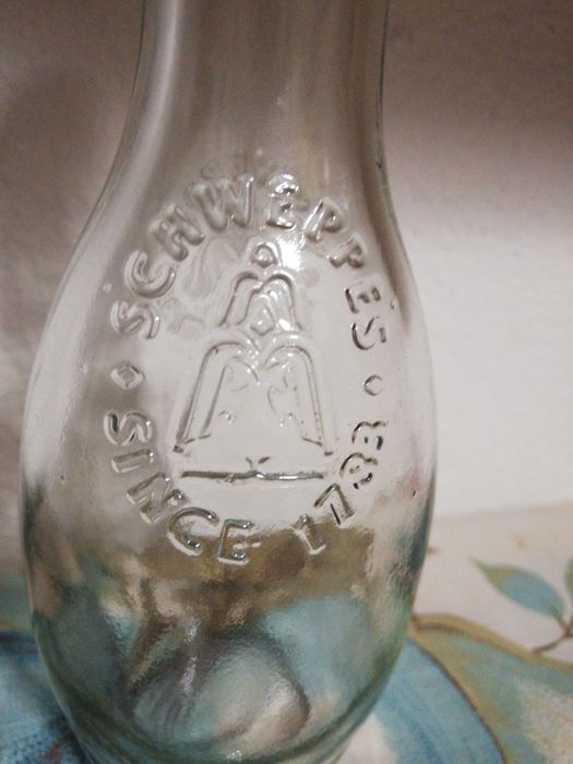 Bolsa pele/garrafa Schweppes