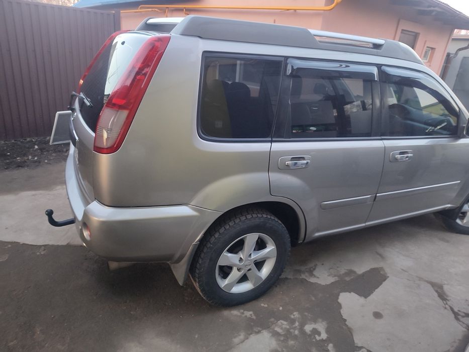 Nissan.   X Trail