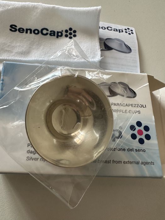 Conchas de prata para amamentação.