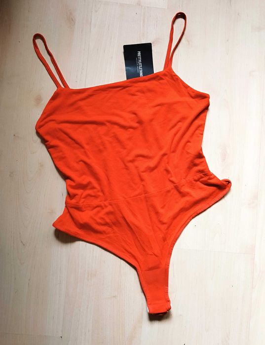 pomarańczowe body na ramiączkach L gładkie dopasowane elastyczne oranż