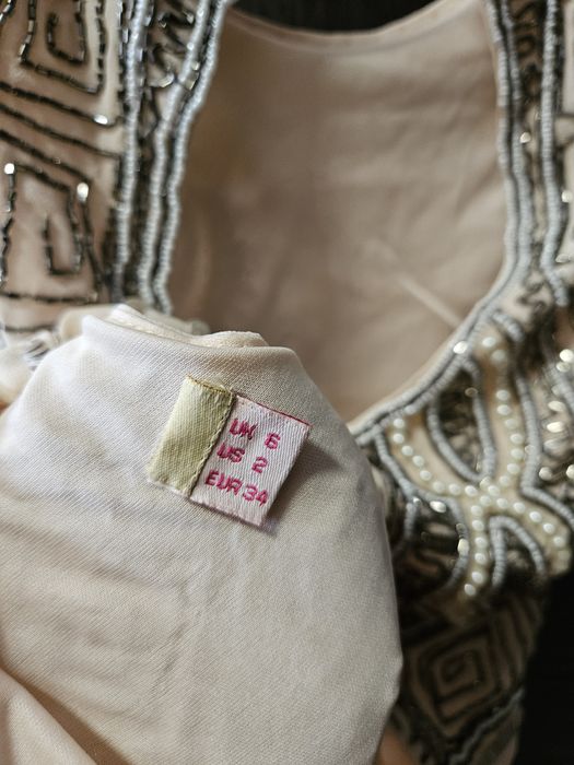 Piękny cekinowy top Nowy rozm. 34