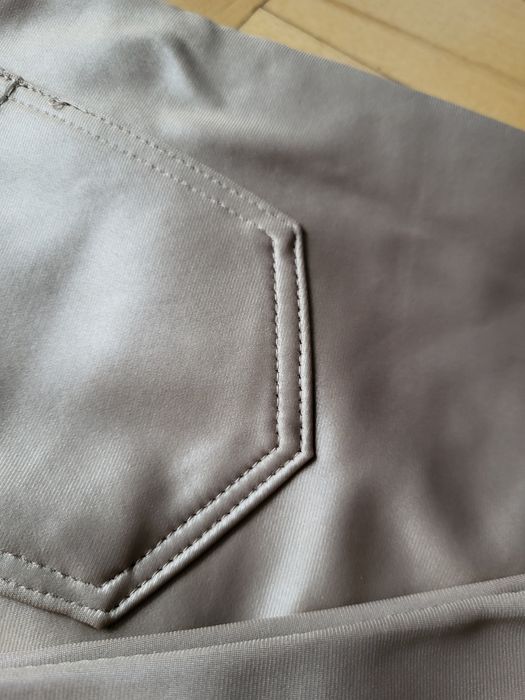 Spodnie leginsy jasny beż r. 44