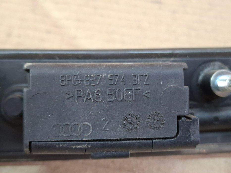 Audi A3 8P 03-12 Подсветка номера номерного знака накладка 8P4827574