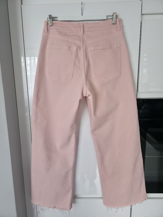 Jeansy H&M pudrowy róż rozm. 42