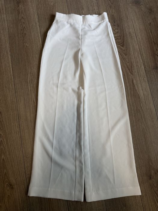 Молочні брюки Zara