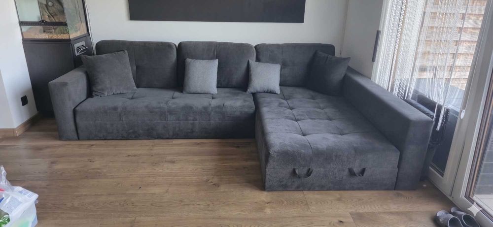 Szara sofa narożna XL – wygodna, rozkładana + pojemnik na pościel