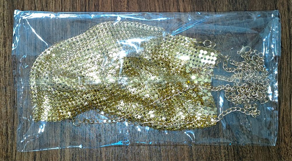 Top de senhora lantejoulas em metal dourado sem costas