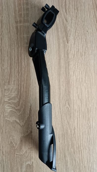 Підніжка регульована на перо велосипеда