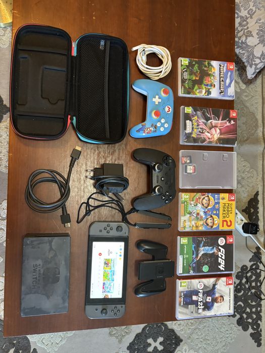 Nintendo switch com jogos e acessorios