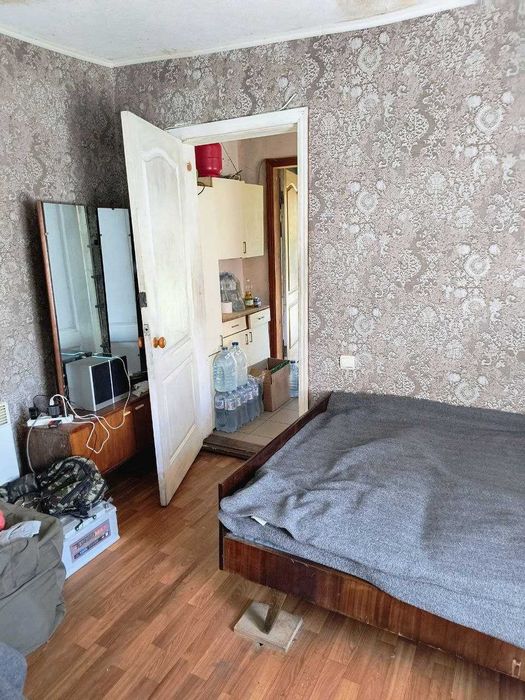 Продам 1/2 дома в центре Змиева