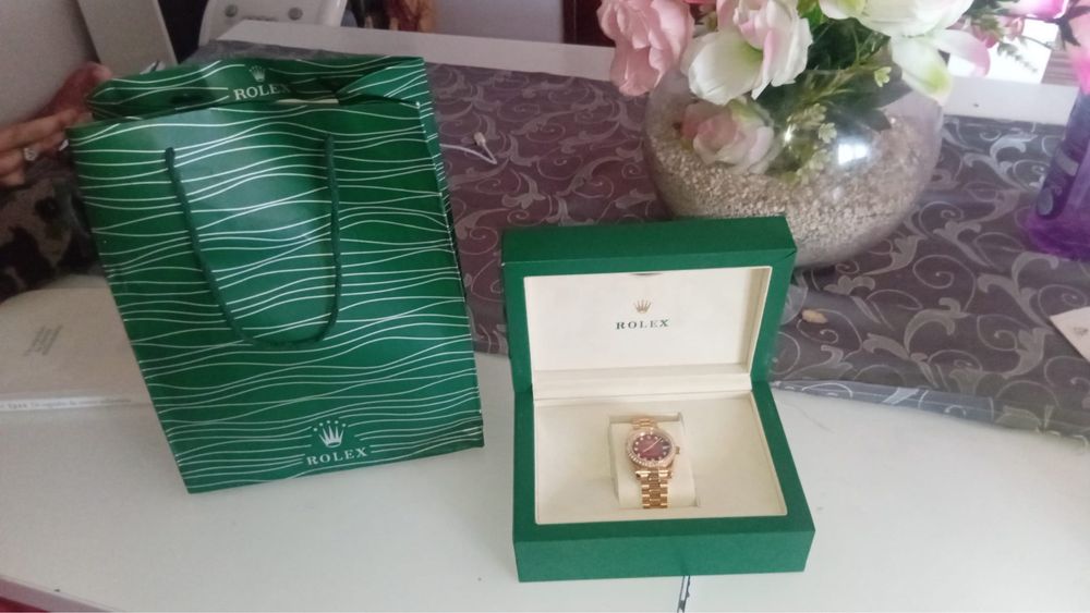 Rolex gold and red