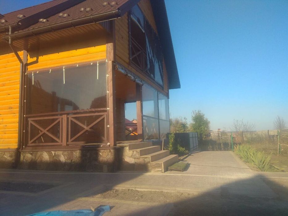 Прозрачные шторы из пленки Одесса от ветра , дождя, снега.