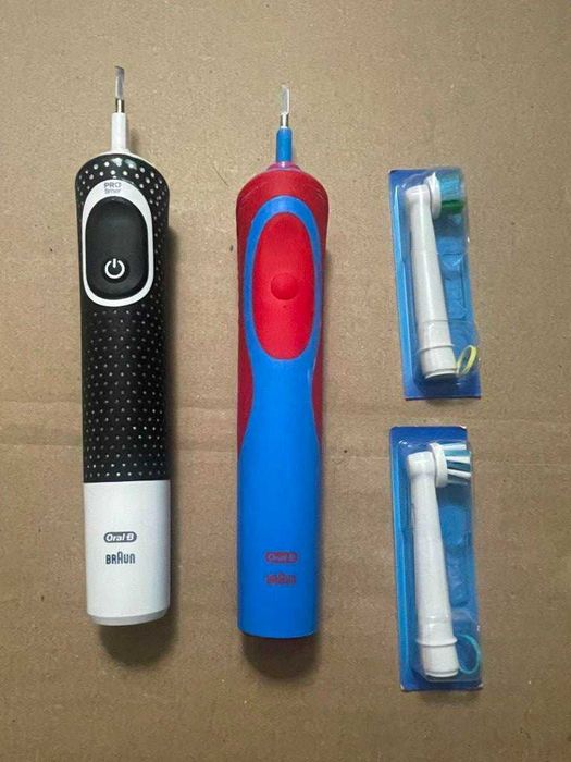 Dwie elektryczne szczoteczki do zębów Oral-B
