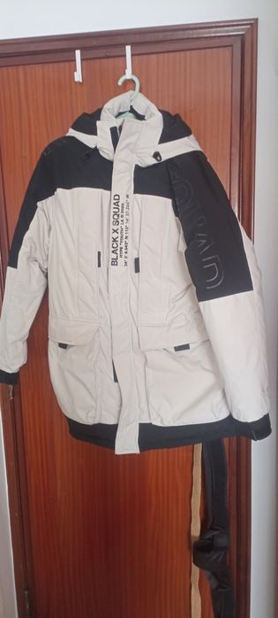 Casaco com vários bolsos