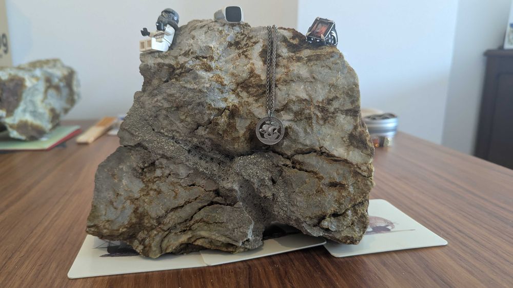 big beautiful rock (copper, silver, granite) to display jewelry or other items