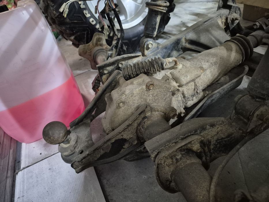 Oś tylna dyfer hamulec wahacz Suzuki Eiger 400