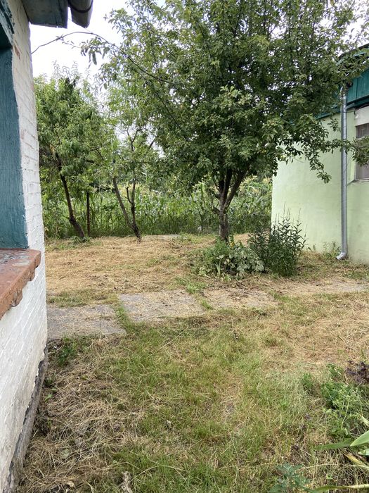 Продам земельну ділянку з будинком