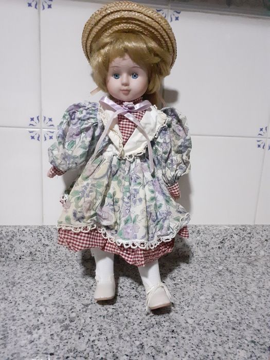 5 bonecas de porcelana