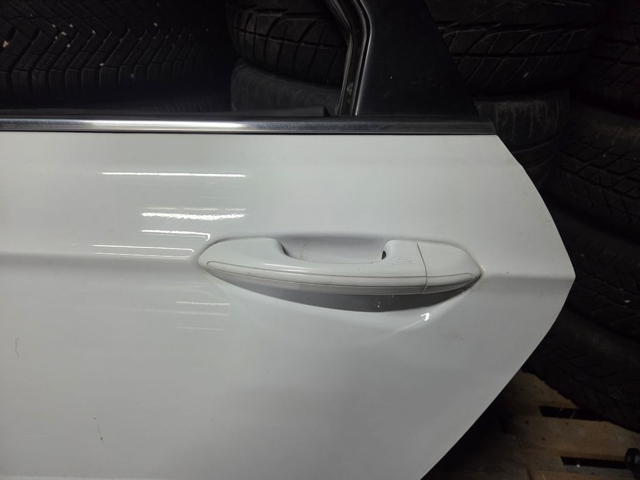 Białe drzwi lewy tył Ford Mondeo MK5 Lift