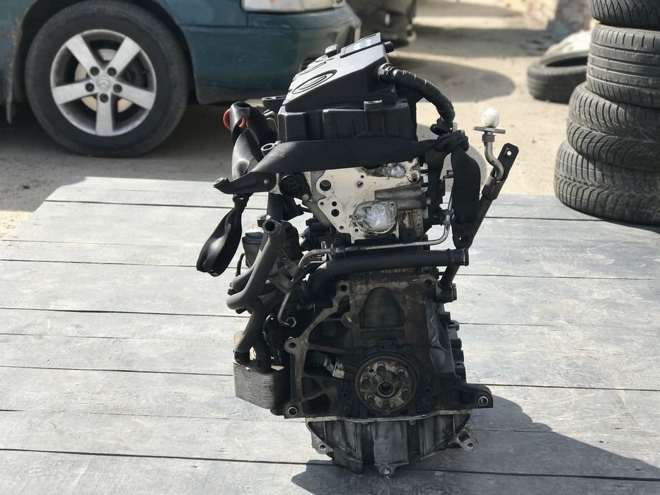 мотор двигатель 1.9 bls 77kw passat b6 golf 5 skoda a5 touran caddy