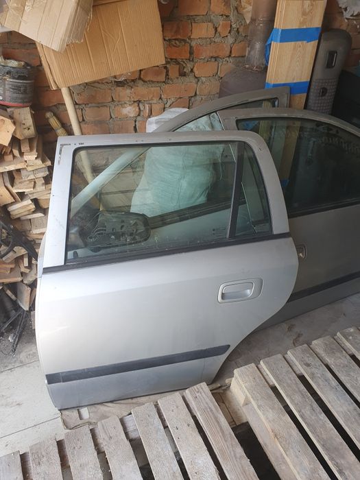 Двері   опель   астра   ж