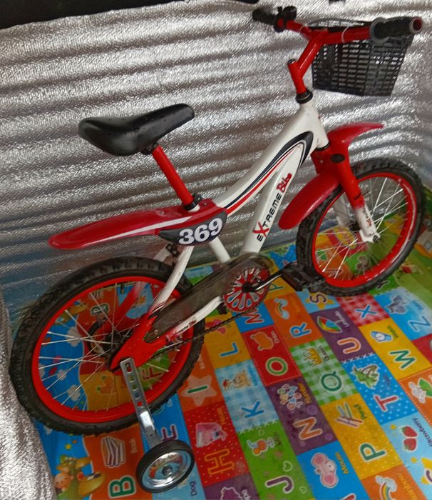 Продам детский велосипед Extreme Bike на 18 дюймов+колесики.