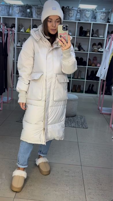 Пуховик в молочному кольорі