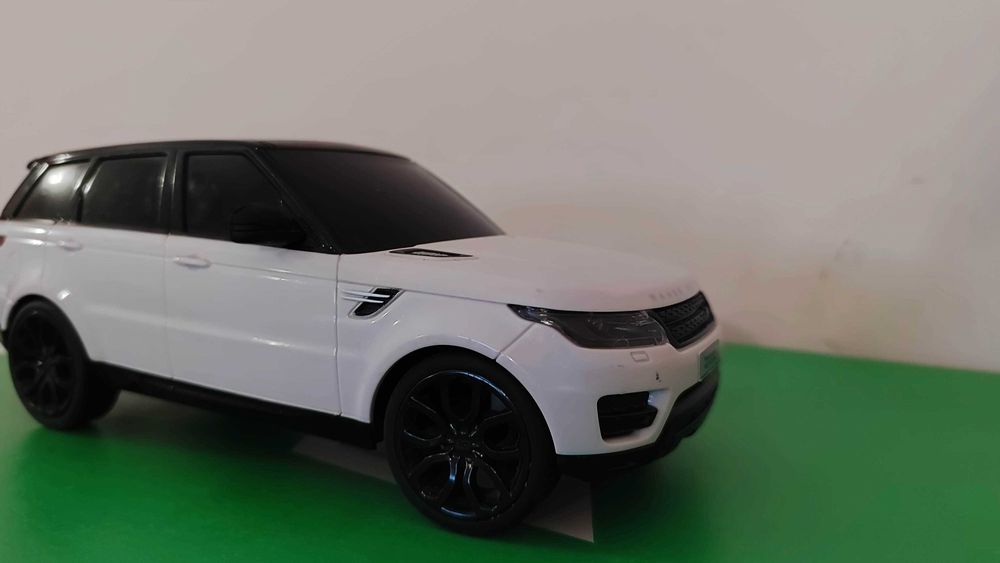 Іграшка машинка автомобіль Land Rover Range Rover Sport у масштабі 1:24