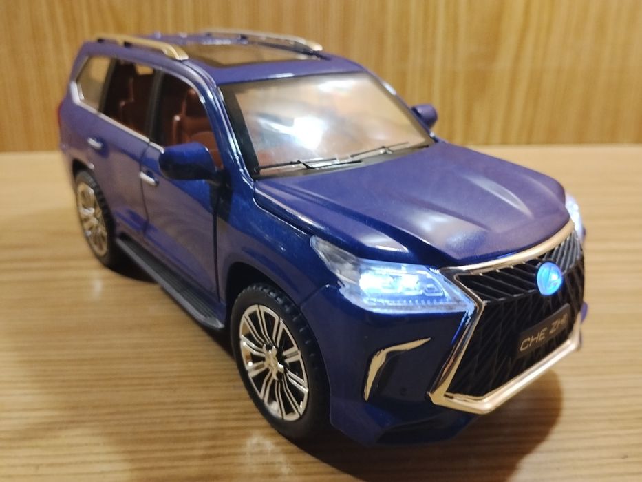 Коллекционная модель Lexus LX 570 1:24 автоэксперт Лексус металл свет