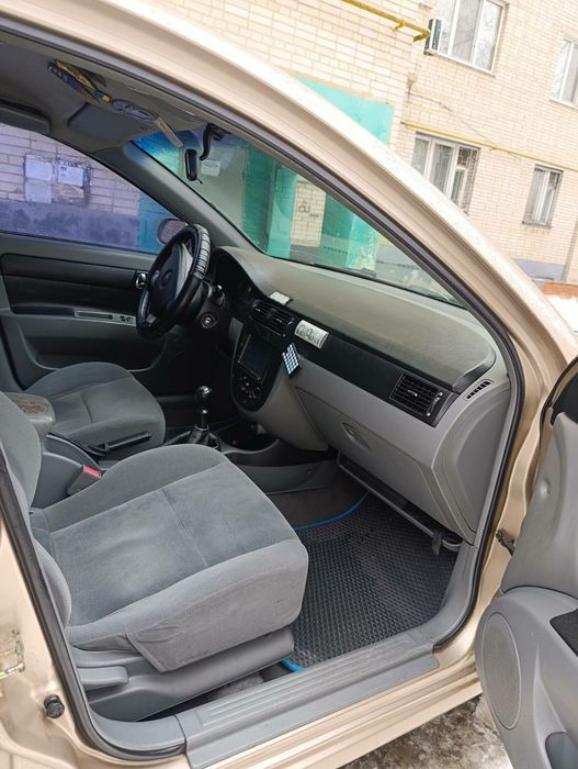 Шевроле  Лачети 1.8