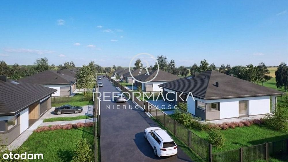 Parterowe domy wśród drzew nieopodal Rzeszowa