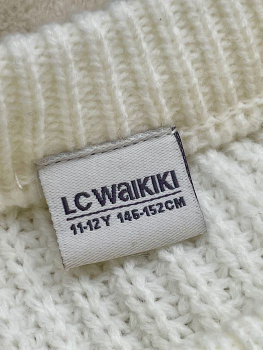 Вʼязана молочна кофта