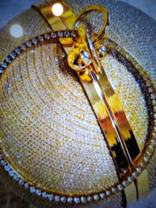 Nowa . Torebka złota kula na nadgarstek i na ramię.