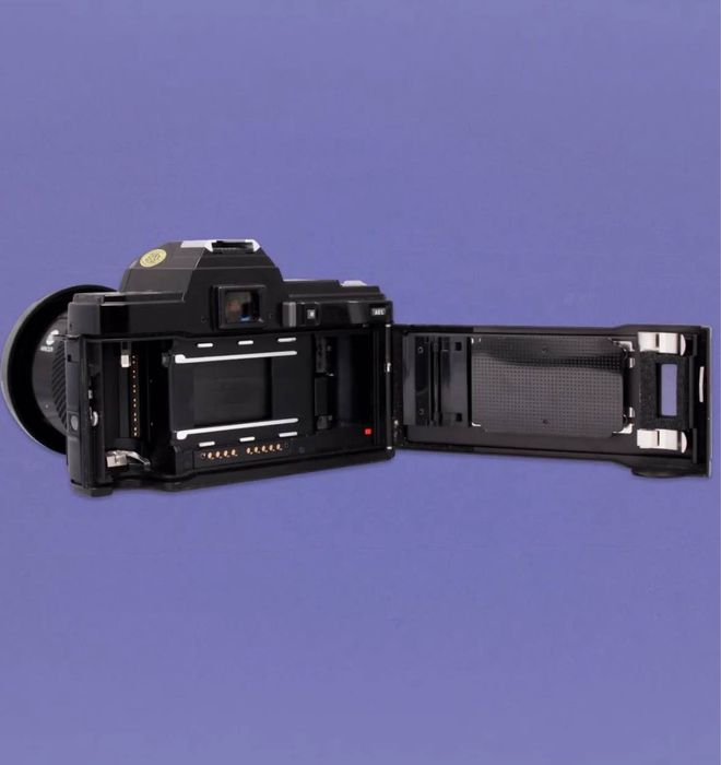 Дзеркальна камера MINOLTA MAXXUM 7000.