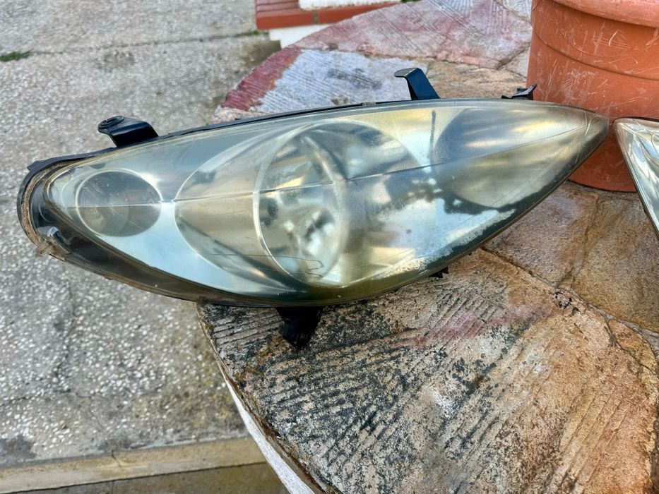 Farol dianteiro Peugeot 307 hdi