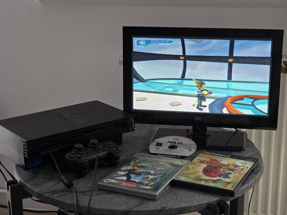 Playstation 2 + modchip + 3 gry