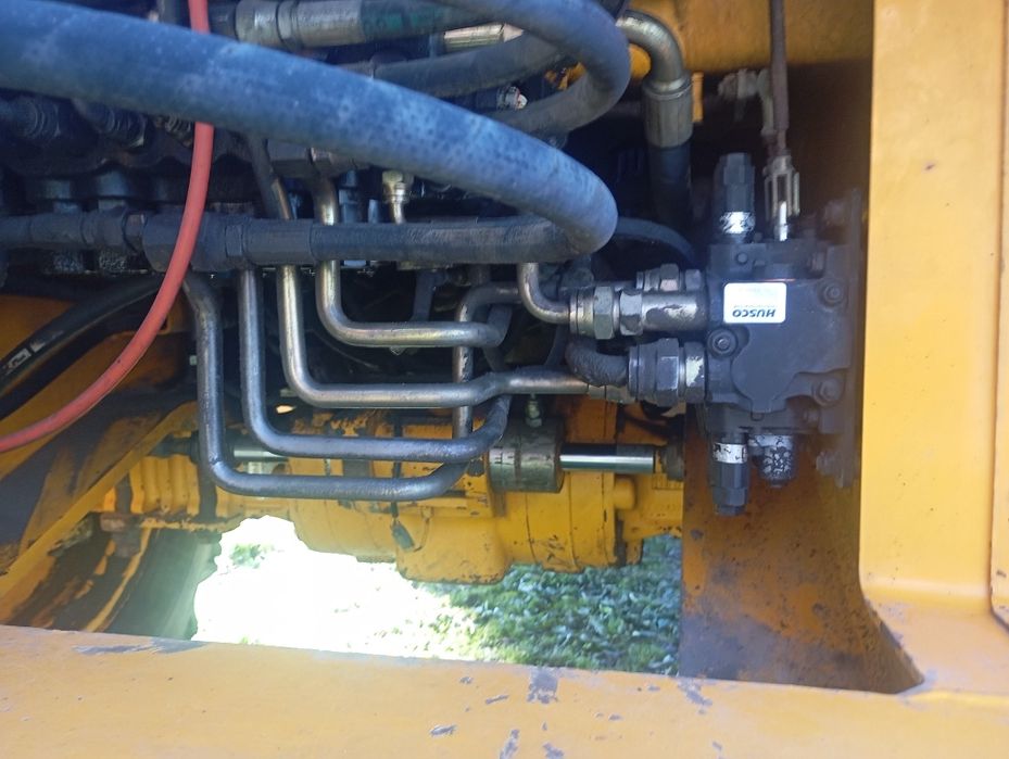 koparko-ładowarkę JCB   SANKO MST M544