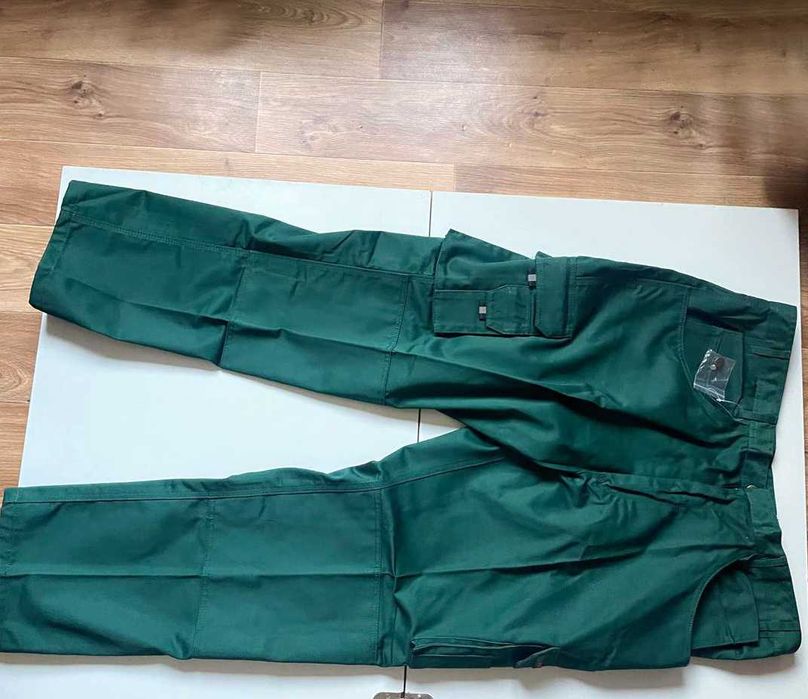 Робочі штани темно-зеленого кольору Uneek Super Pro р. 54 (2XL)