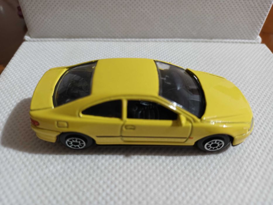 Miniaturas 1/64 Welly CM