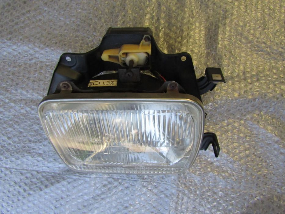 Farol (otica ) Opel Campo , original (ver descrição)
